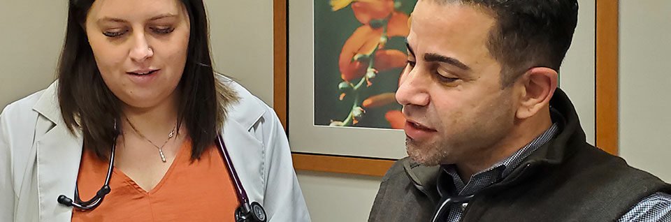 Doctors reviewing paperwork